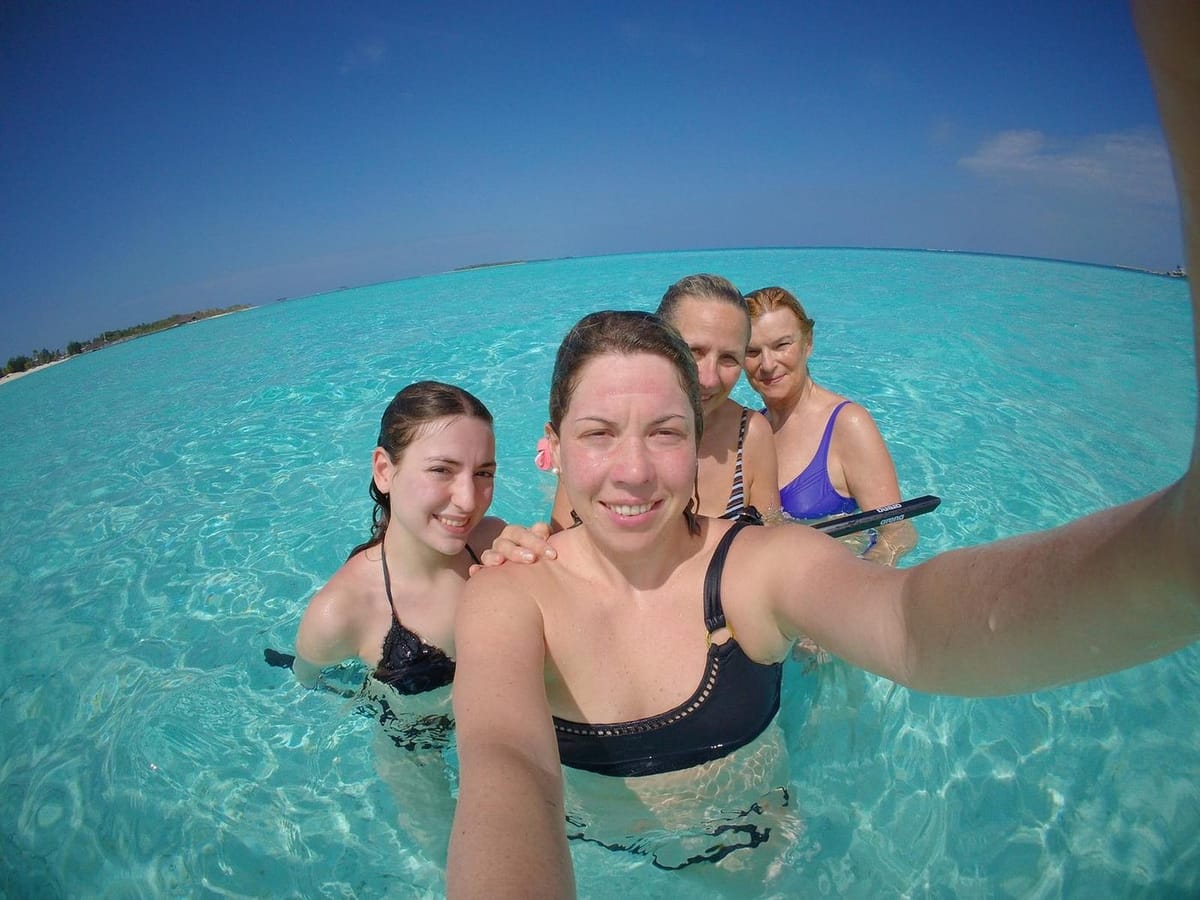 Guests relaxing in the lagoon near Vilu Residence, Maldives